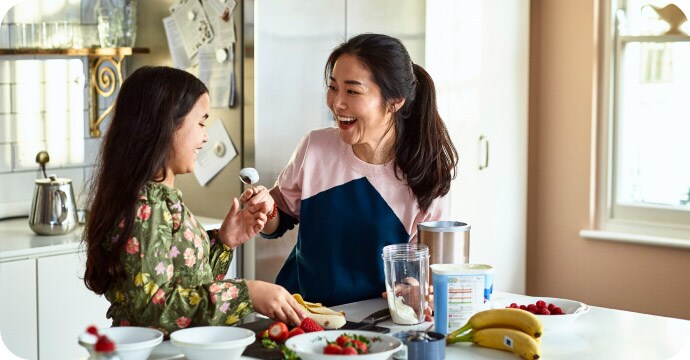 Mother and daughter in the kitchen.