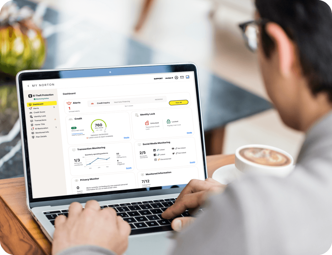 A man uses LifeLock Ultimate Plus to monitor his credit score.