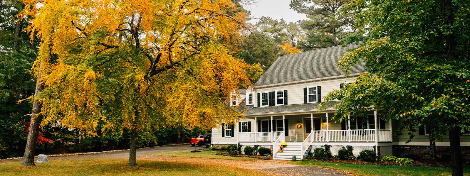 A picture depicts a house that may be at risk of home title theft.