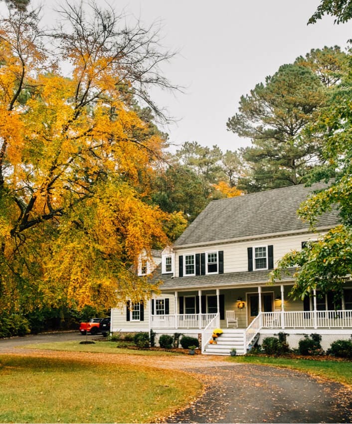 A picture depicts a house that may be at risk of home title theft.