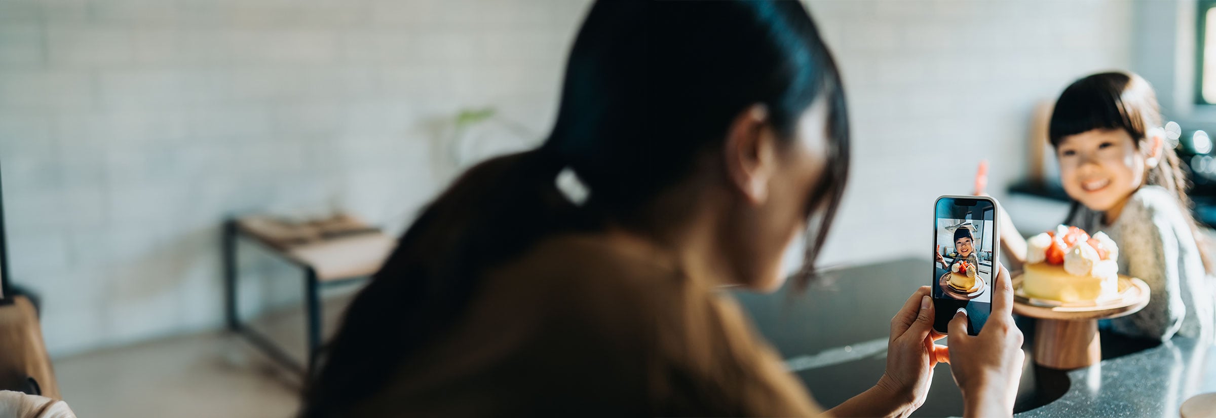 Woman using a mobile device to securely remove personal information from the internet.