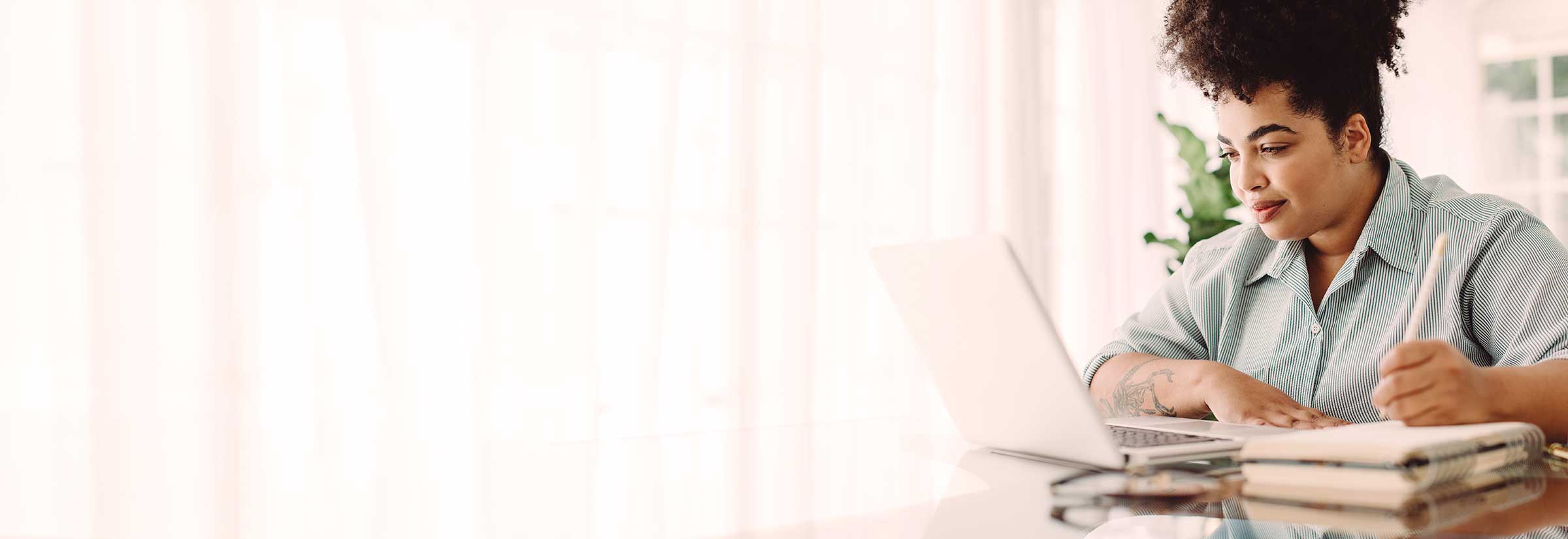 Freelancer viewing Fiverr’s website on their laptop.