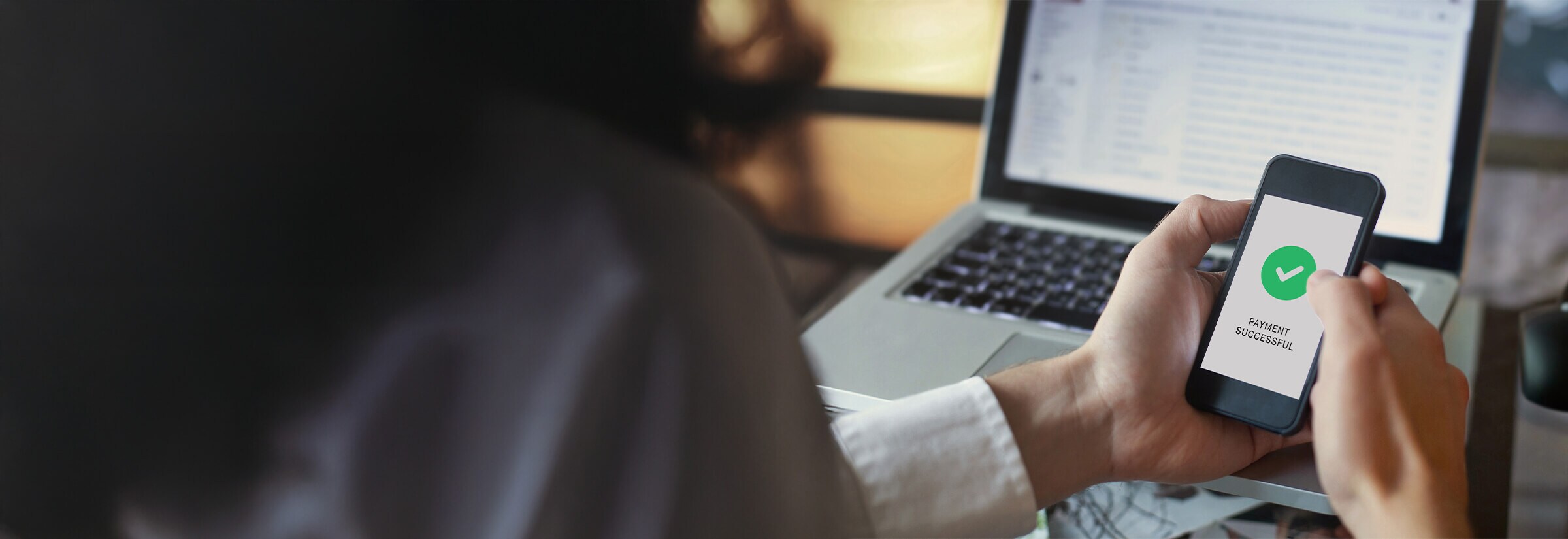 An image of a wire transfer processed successfully on a phone.