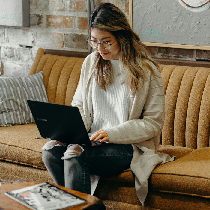  A woman uses LifeLock to check her credit report for free.