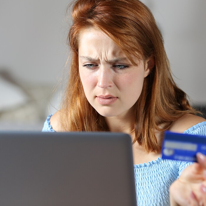 A person who is experiencing identity theft from a data breach.
