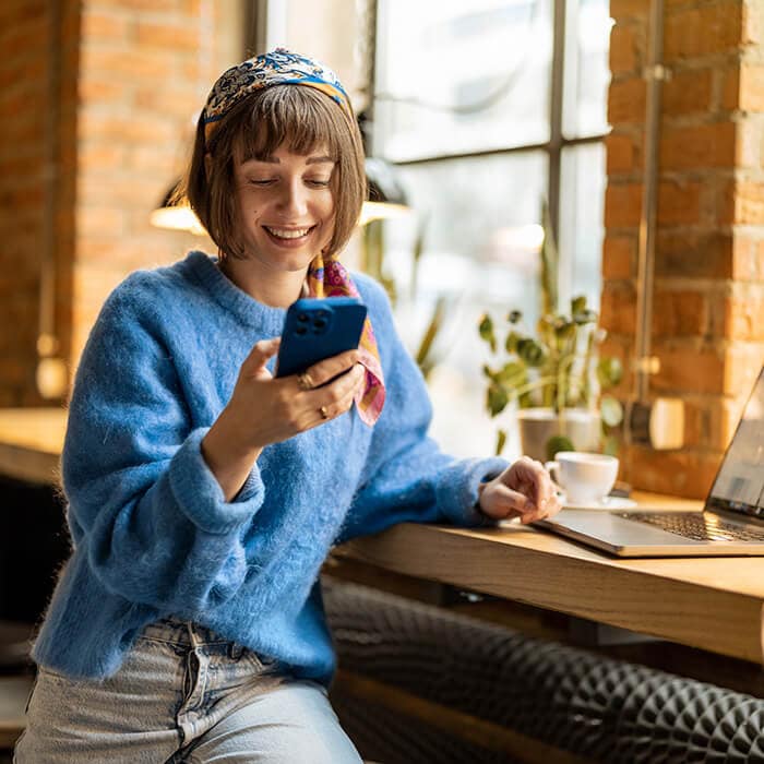 A woman protects her personal information by using additional security measures like two-factor authentication. 